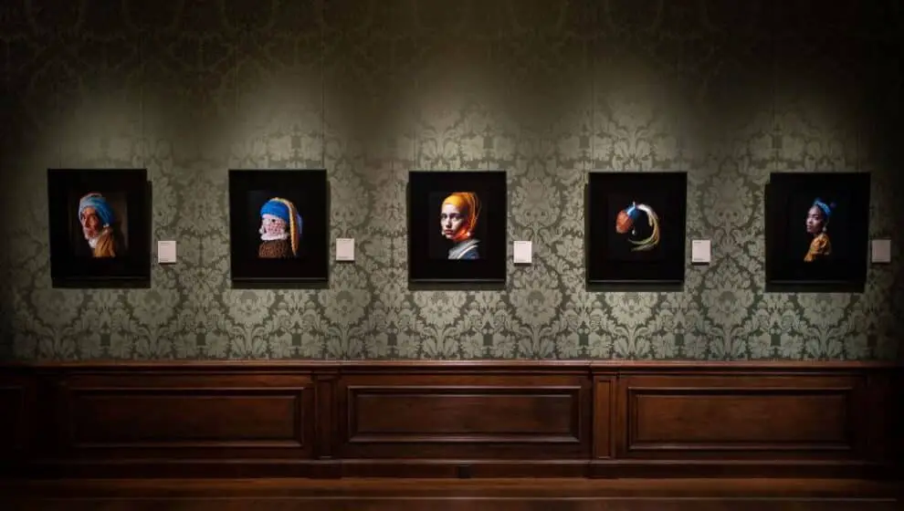 This photograph taken in The Hague museum shows images designed with artificial intelligence by Berlin-based digital creator Julian van Dieken