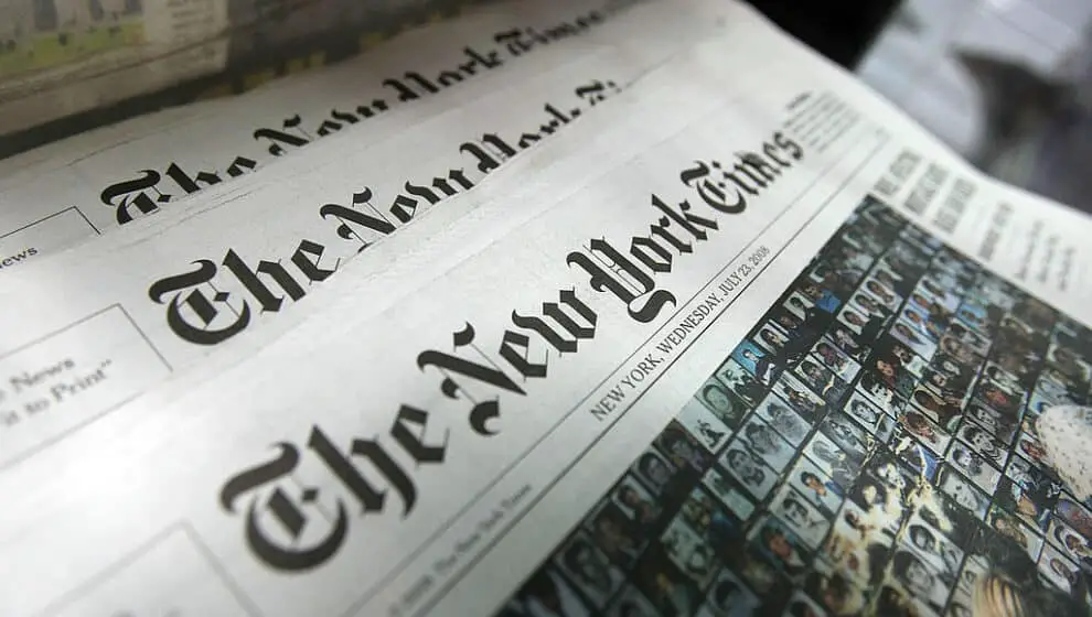 Copies of the New York Times sit for sale in a rack in New York City
